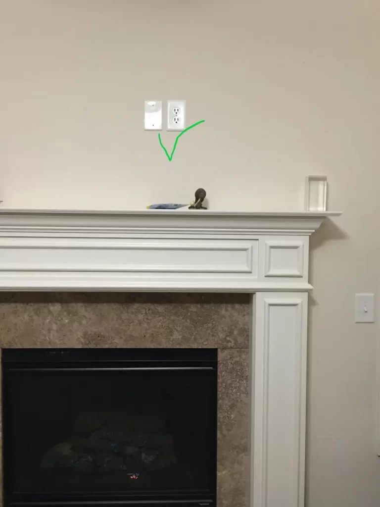 Correctly Placed outlets above a fireplace