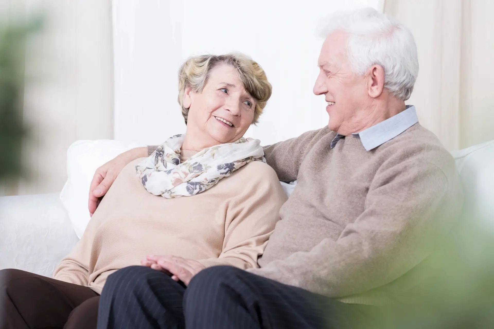 Elderly Couple Enjoying Peace of Mind with Smart Home Care